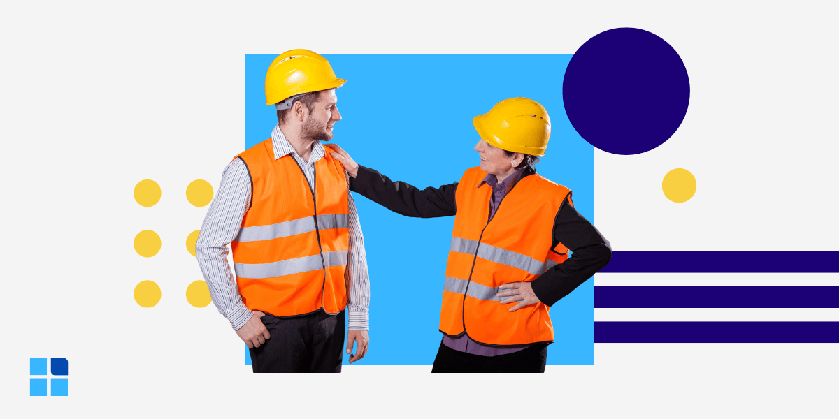 Two construction workers wearing orange safety vests and yellow helmets.