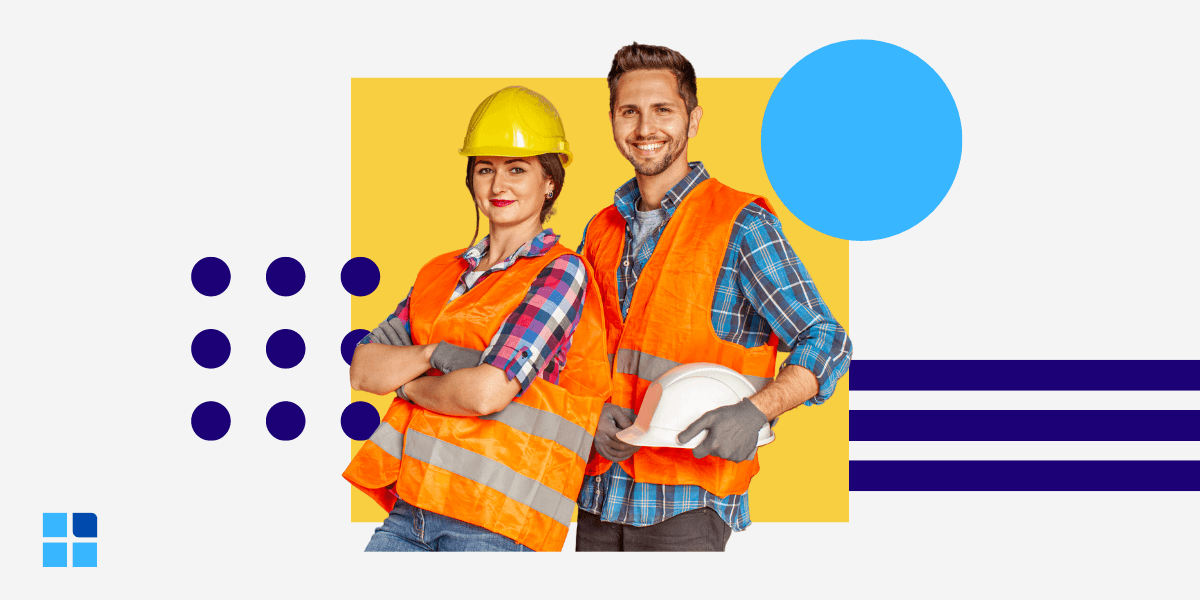 Two construction workers in orange safety vests and hard hats, smiling confidently.