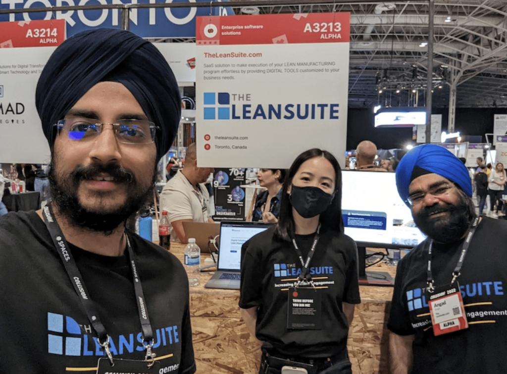 LeanSuite co-founders and team at their booth during the Collision tech conference in Toronto.
